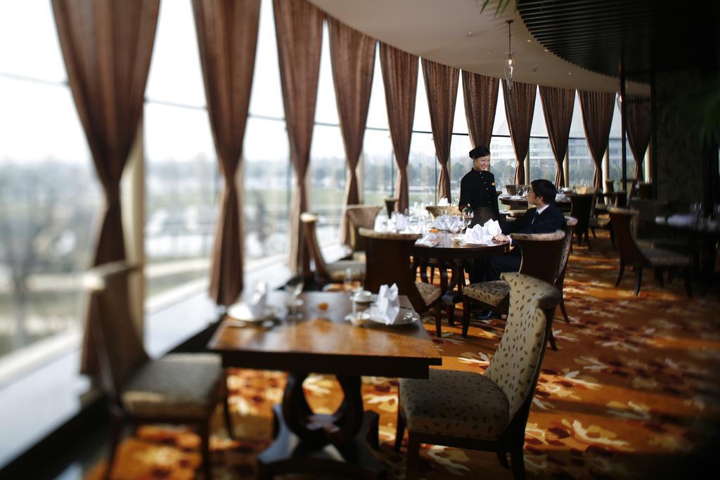 New Century Grand Hotel Ningbo Extérieur photo